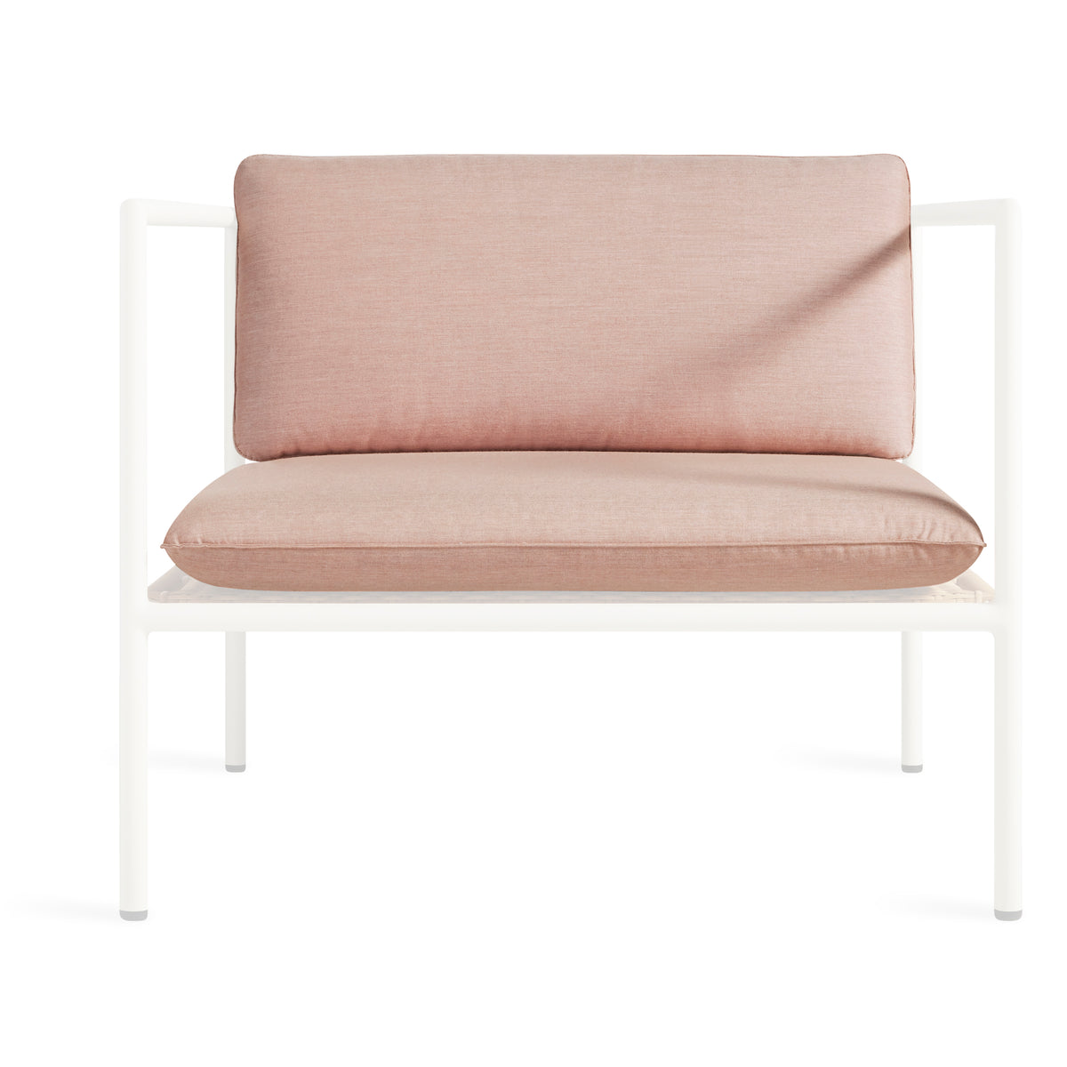 A modern outdoor lounge chair with a white metal frame and thick, textured blush pink cushions on a solid white background.