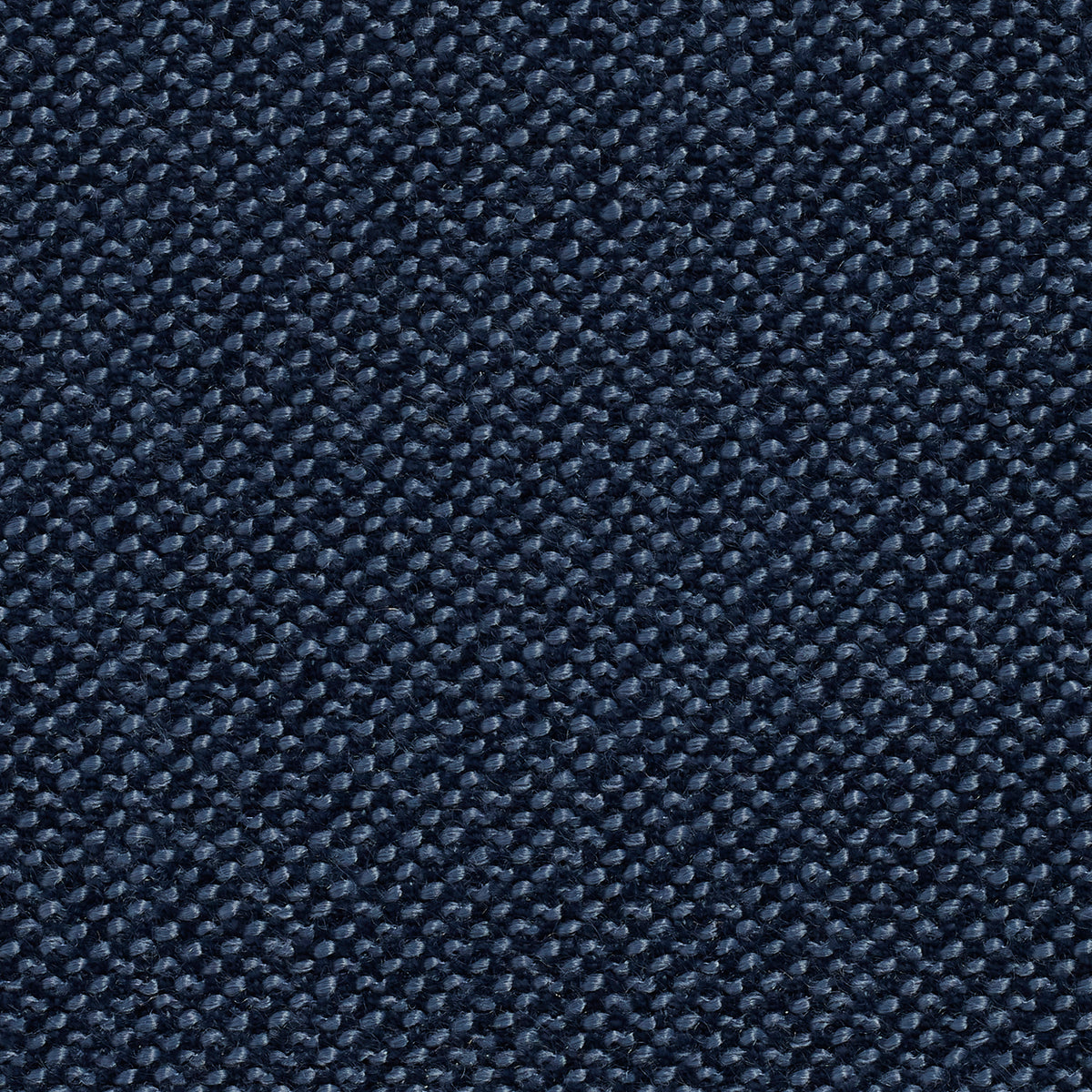 Close-up of a textured navy blue fabric surface