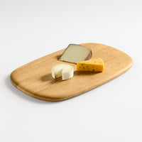 Serves Up Medium Cutting Board in White Oak - Angle 2