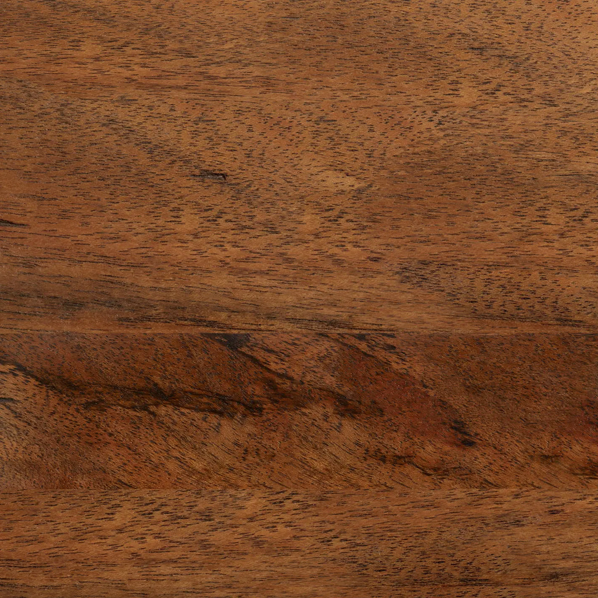 A close-up image of wooden flooring with a natural brown grain pattern.