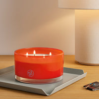 The Shop Candle in Dayglow Orange - Angle 2