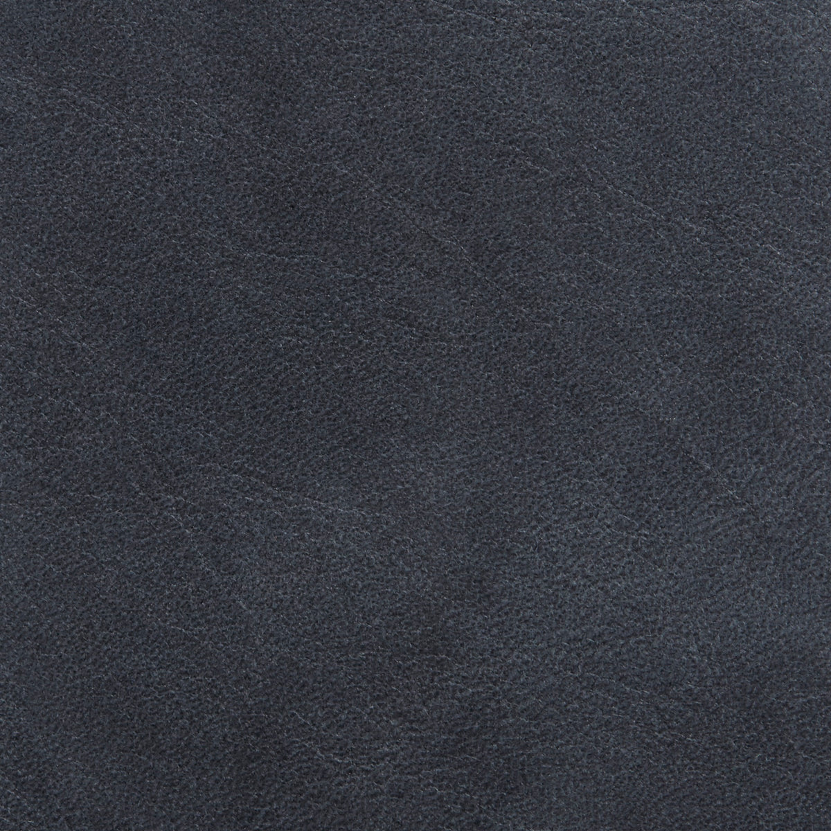A close-up image of a navy blue leather material.