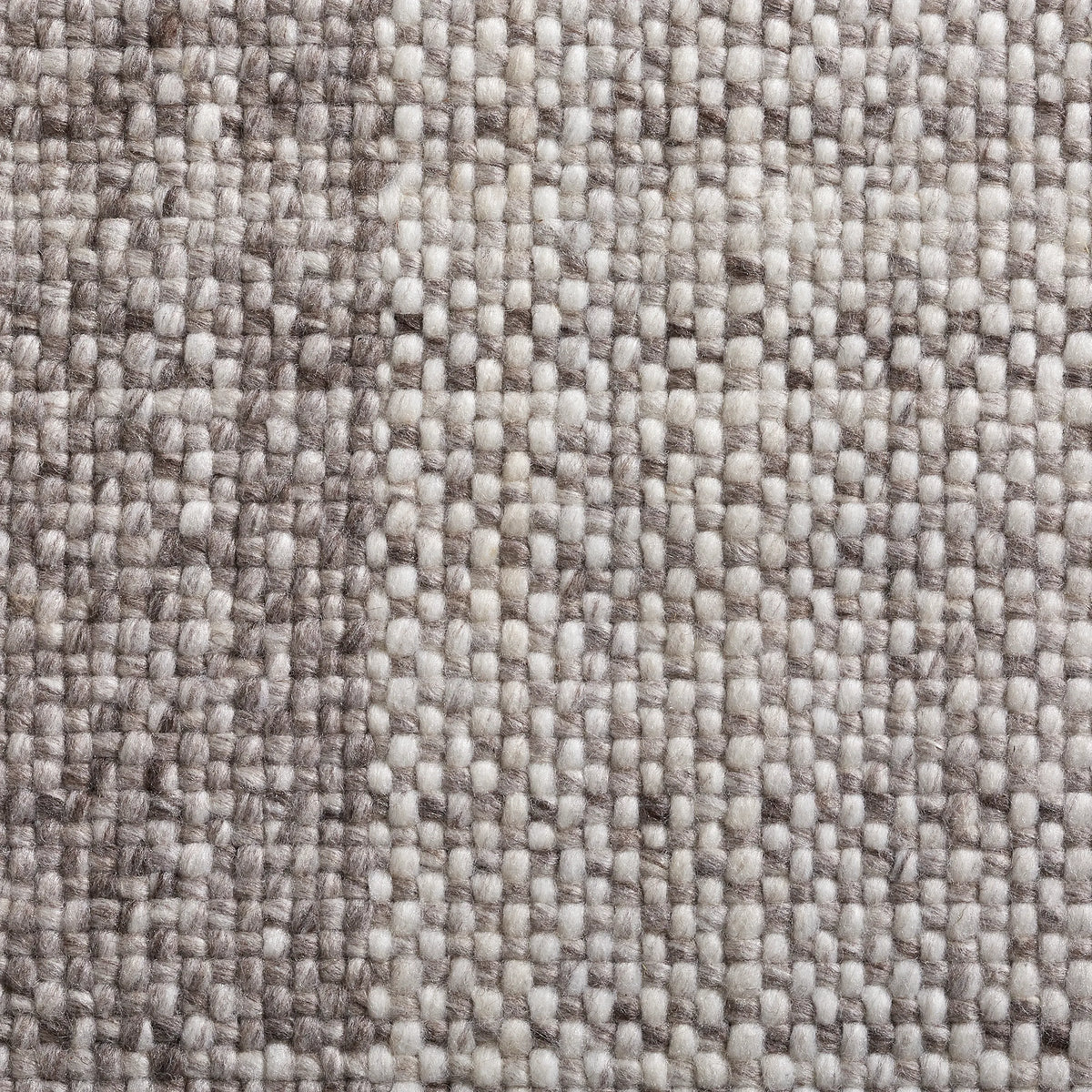 Close-up of a textured brown and beige fabric pattern